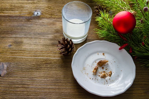 Emply plate glass from cookies and milk for Santa Clause — Stock Photo, Image