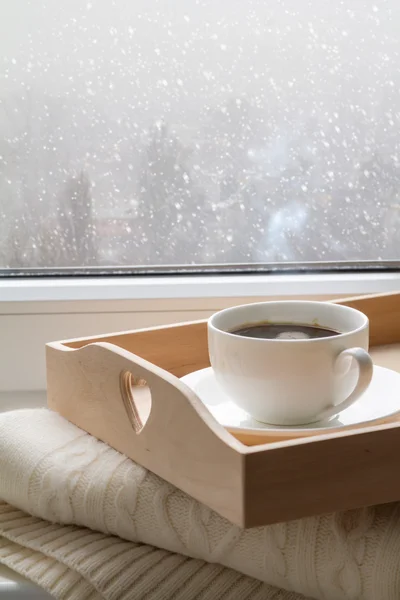 Coffee on tray and sweater — Stockfoto