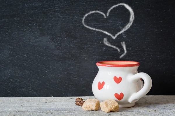 Kaffekopp med hjärtan — Stockfoto