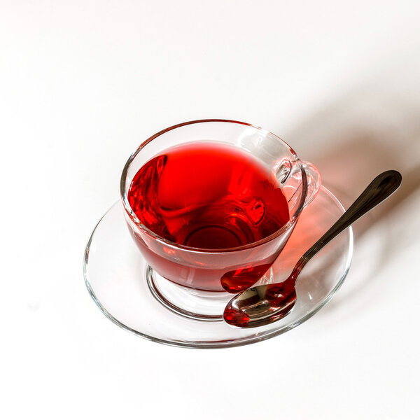 Cup of Karkadeh Red Tea  on a white background