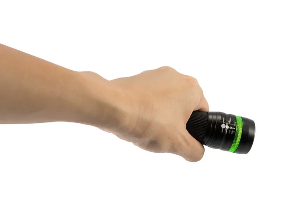 Hand holding black flashlight isolate on white background — Stock Photo, Image