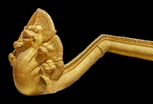 Golden Naga statue Thai art style isolated on black background — Stock Photo, Image