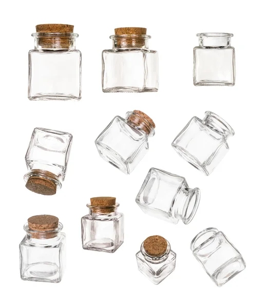 Set de frascos vacíos cerrados y abiertos con tapón Imagen de stock