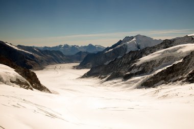 Mountain peaks, glaciers, ice and permanent snow on Jungfraujoch, Switzerland