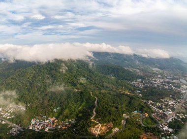 Aerial view drone photography High angle view of Phuket patong city near the sea, Phuket province Thailand, Panorama of phuket city thailand in sunny day