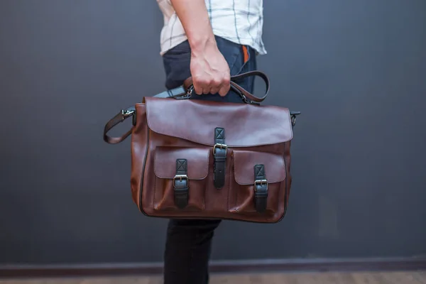 Man Holding Brown Leather Messenger Bag Hand Unisex Bag Sale — Stock Photo, Image