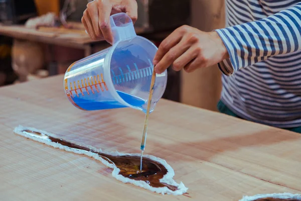 Carpenter Pouring Linseed Oil Wooden Table Process Making Wood