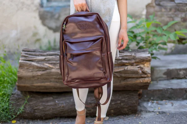 Woman Holding Brown Leather Backpacks Hand Unisex Bag — Stock Photo, Image