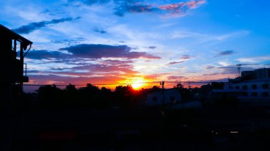 Sunset background, Hard sunlight view, beautiful sky in the evening, sunset with colorful sky in the evening