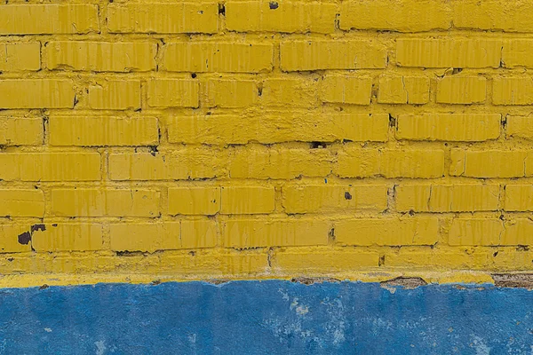노란색-파란색 벽돌 벽의 질감 — 스톡 사진