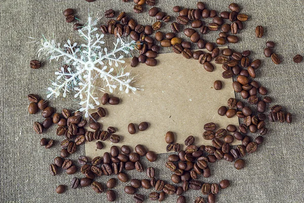 Blank card with snowflake and coffee beans — Stock Photo, Image