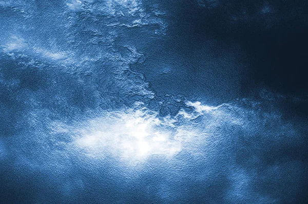 Buz dokusu. Donmuş suyun buz dokusu. Donmuş suyun mavi buzu.