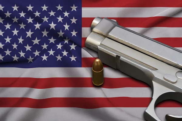 USA Gun Laws flag with pistol gun and bullet — Stock Photo, Image