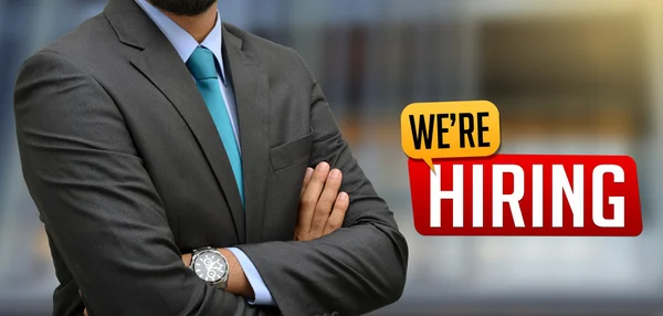 Professional with We are hiring Sign Banner — Stock Photo, Image