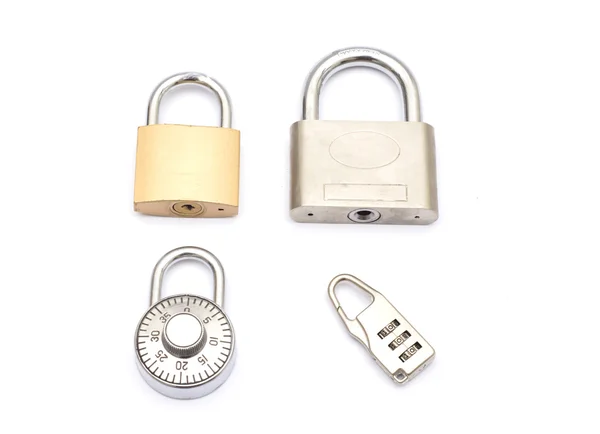 Different type of Locks on white background - security concept — Stock Photo, Image