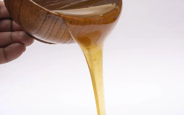 Natural Honey Pouring Closeup White Background Banner — Stock Photo, Image