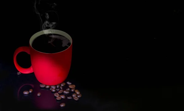 Black Coffee in red cup with coffee beans banner concept.