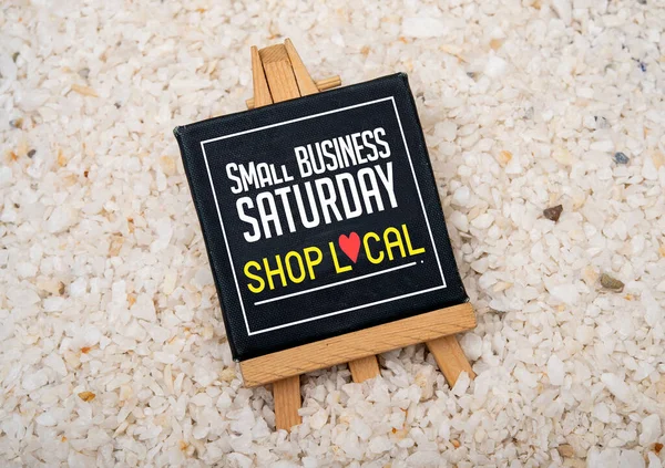 Small Business Saturday and shop local sign for businesses.