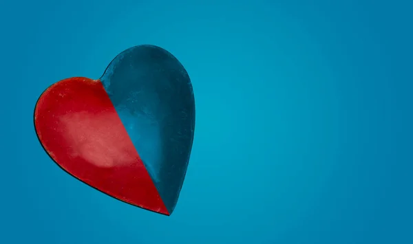 Red and blue color heart with banner and copy space.