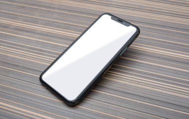 Boş cep telefonu modeli ahşap masada..