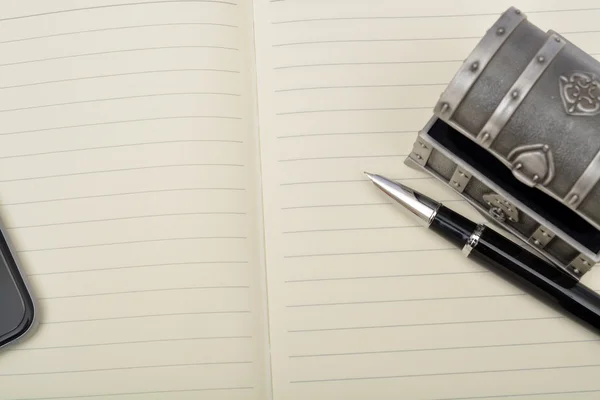 Geheim van succes met pen en Opmerking boek — Stockfoto