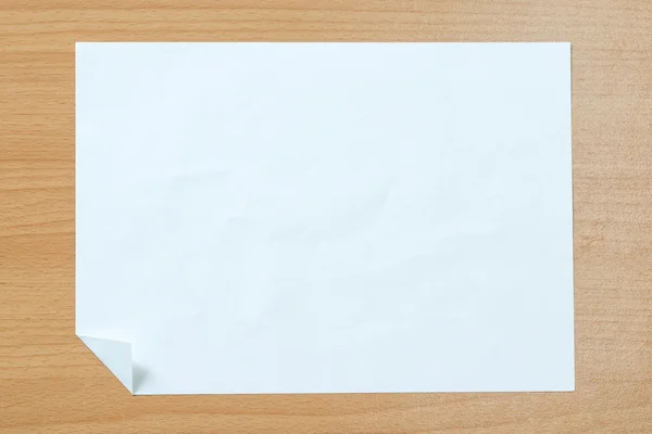 White paper  on a wooden floor. — Stock Photo, Image