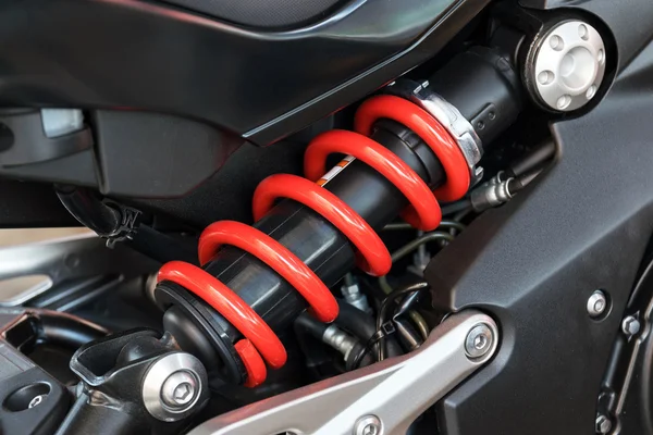 Motorcycle shock absorber a device for absorbing jolts.