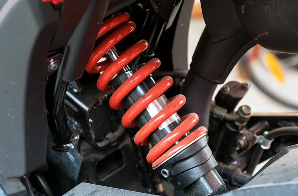 Motorcycle shock absorber a device for absorbing jolts. — Stock Photo, Image