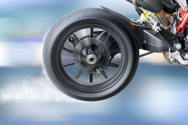 Test the rotation of the wheel  of a motorcycle tire. — Stock Photo, Image