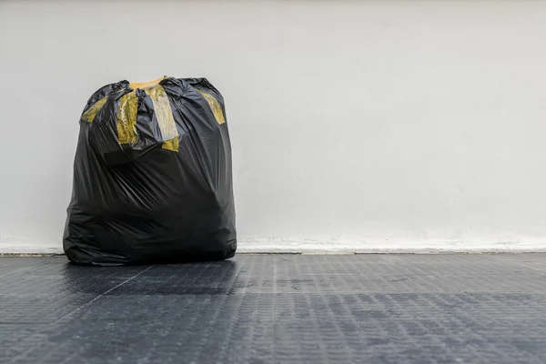 Black garbage bag — Stock Photo, Image