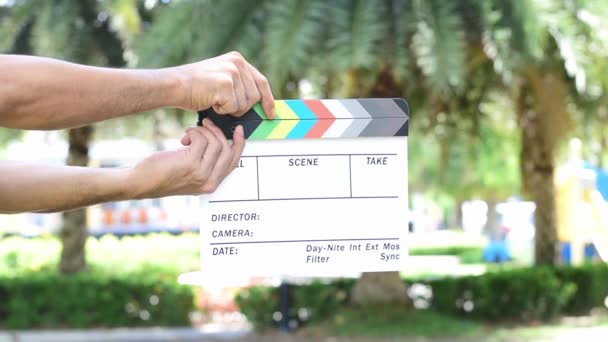 Hand Holding Movie Slate Colors Board Movie Cinema Television Industry — Stock Video