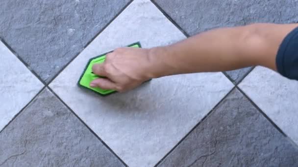 Top View Human Hand Using Green Color Plastic Floor Scrubber — Stock Video