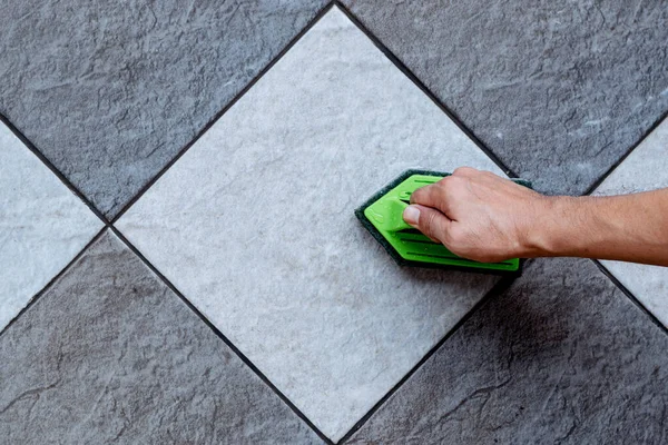 Top View Human Hand Using Green Color Plastic Floor Scrubber — Stock Photo, Image