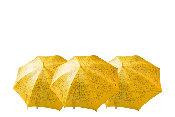 Colorful yellow umbrellas isolated on white background. — Stock Photo, Image