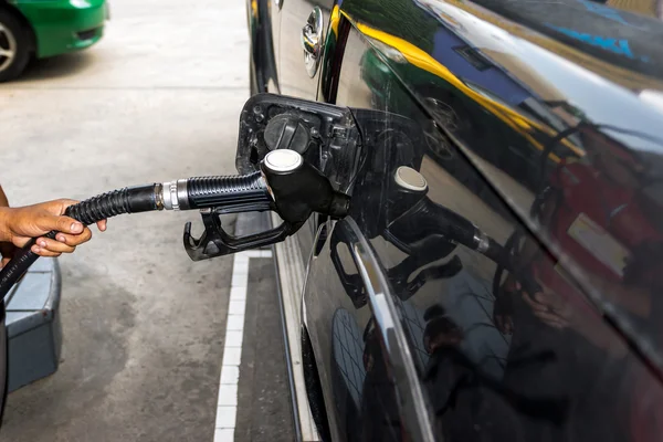 Boquilla de combustible paga por combustible y bencilo . — Foto de Stock