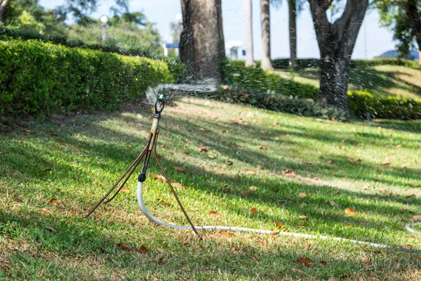 Sprinkler in the park. — Stock Photo, Image