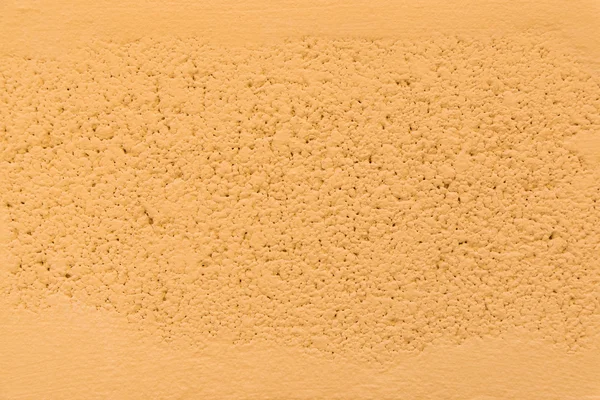 Bela parede de tijolo pintado de laranja . — Fotografia de Stock