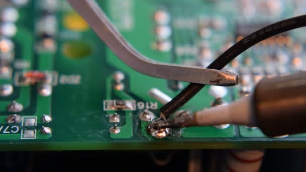 Soldering iron and lead — Stock Video