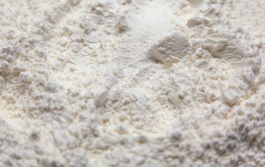 Scattered white flour. Background Macro