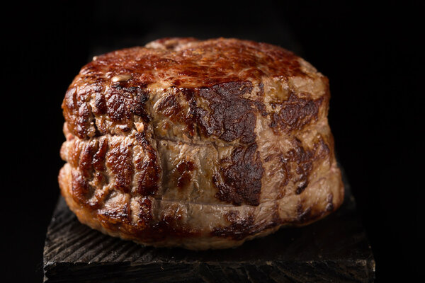 Grilled Steak Meat on the wooden surface