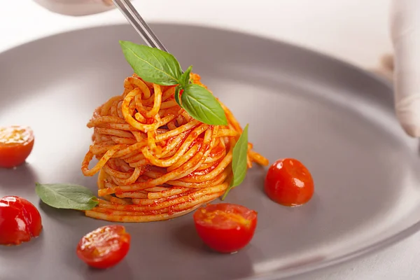 Gloved Chef Uses Tweezers Decorate Gourmet Dish Tomato Sauce Cherry — Stock Photo, Image