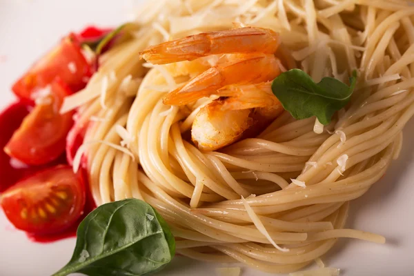 Spaghetti with shrips and parmezan Stock Image