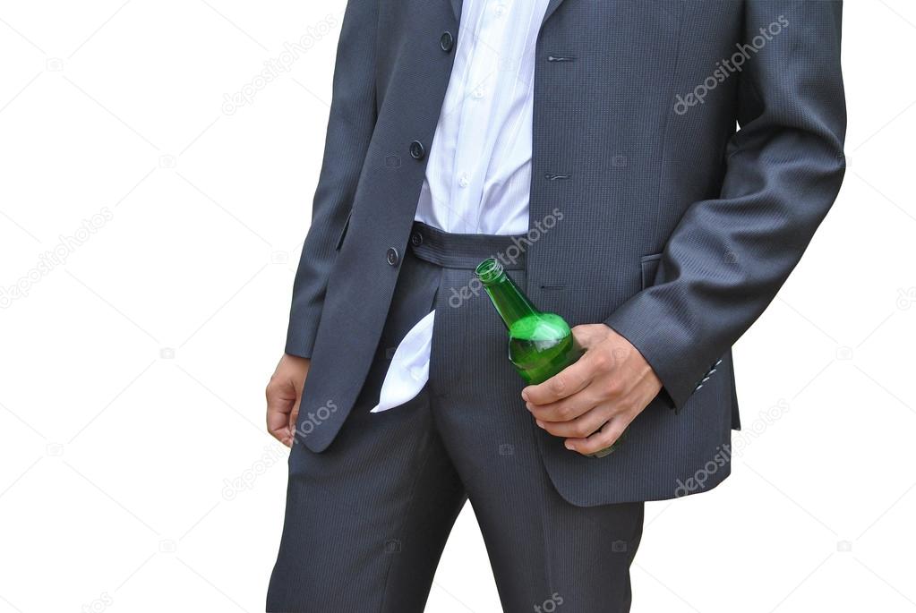 Men in dark suit forgot with green glass bottle