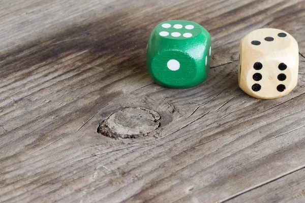 close-up of gaming dice on wooden background