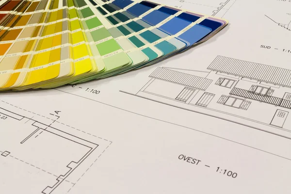 An office desk with the project papers and color chart — Stock Photo, Image