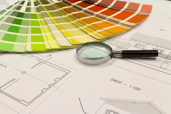 An office desk with the project papers and color chart — Stock Photo, Image