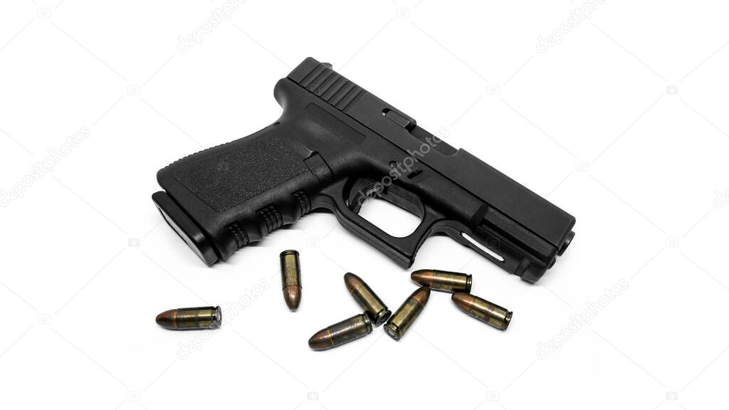 9mm pistol and bullets on white background