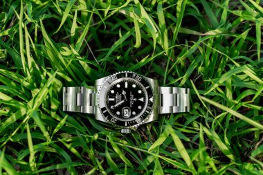 BANGKOK, THAILAND - 14 Temmuz 2019: Rolex Submariner saati dalış işlevlerinde kullanılan seramik bir bezelle donatılmıştır.