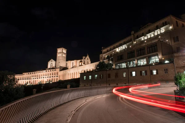 Assisi, Umbria, Italy, May 18 2016, Basilica of Saint Francis of Assisi photographed at night with night trails