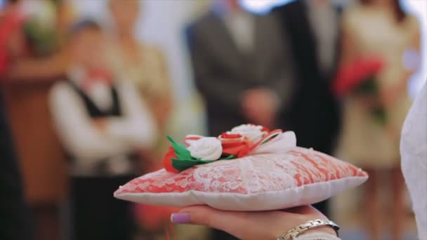 Wedding Witness is Holding Red Cushion With Rings — Stock Video